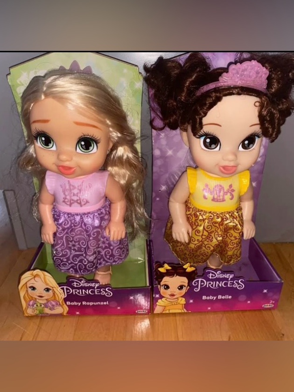 Disney Baby Rapunzel and Baby Belle Dolls - Purple and Yellow Outfits brand new